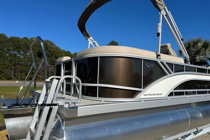Slide: The Image of 2026 Bennington 22 S Quad Bench pontoon boat, Salt Water Series, on display. - 9
