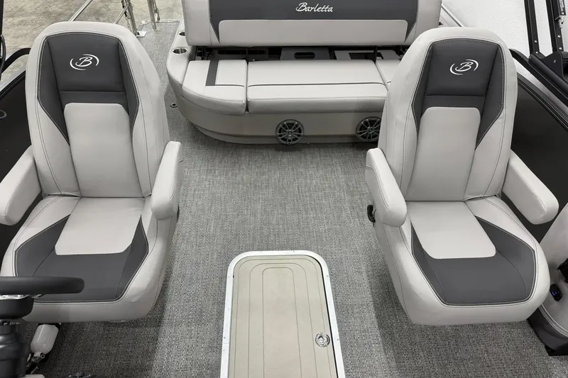 Slide: The Image of 2026 Barletta ARIA 22UC interior with gray seating and carpeted flooring. - 18