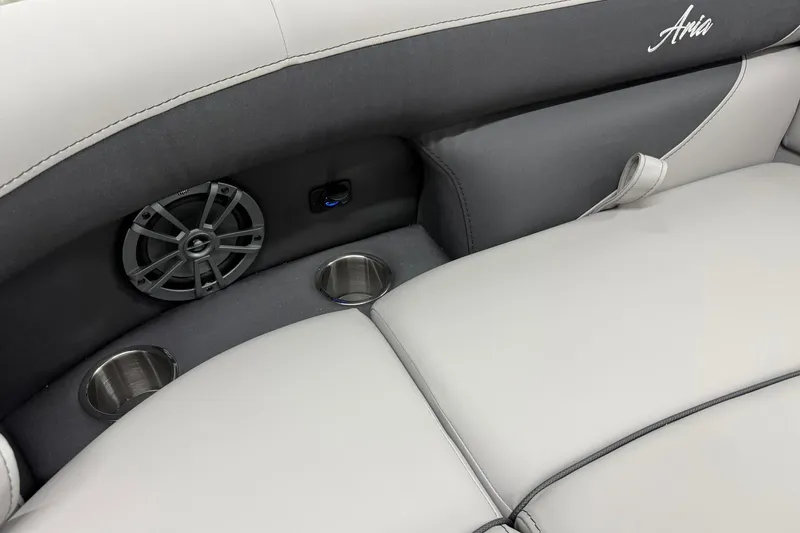 Slide: The Image of Barletta ARIA 22UC 2026 boat interior with speaker and cup holders. - 22