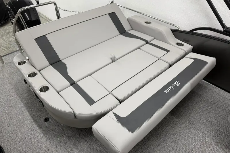Slide: The Image of 2026 Barletta ARIA 22UC boat interior with gray seating and cup holders. - 8
