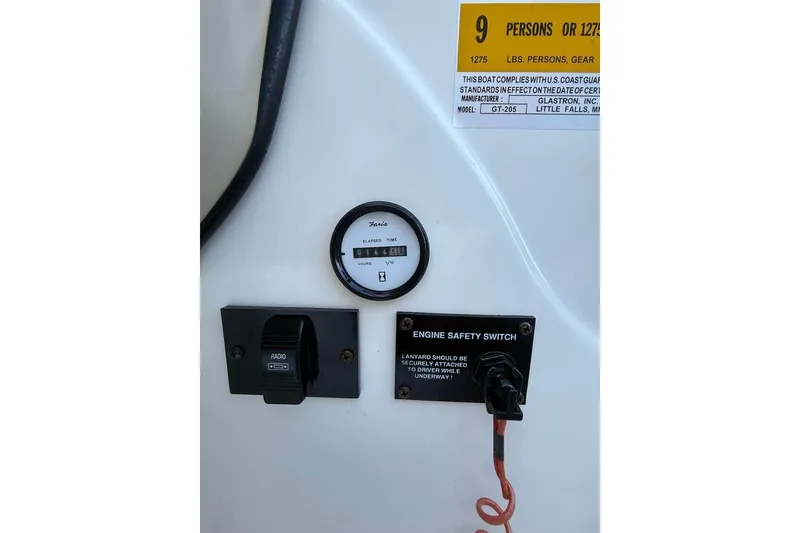 Slide: The Image of Control panel of 2008 Glastron GX 205 boat with safety switch and hour meter. - 10
