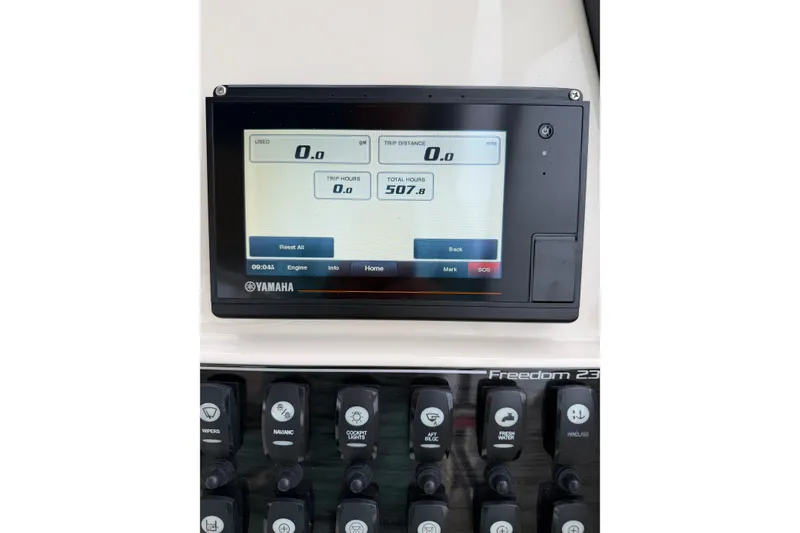 Slide: The Image of Yamaha display on 2019 Grady-White Freedom 235 boat dashboard showing trip data. - 15