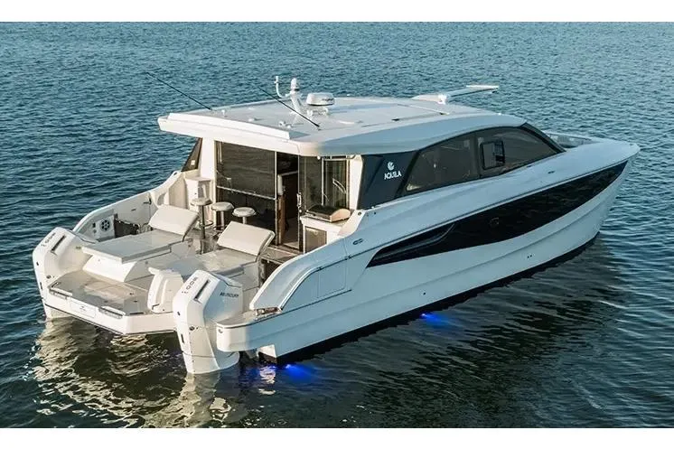 Slide: The Image of Manufacturer Provided Image: Aquila 46 Coupe 2026 luxury yacht on calm water with sleek design and modern features. - 2