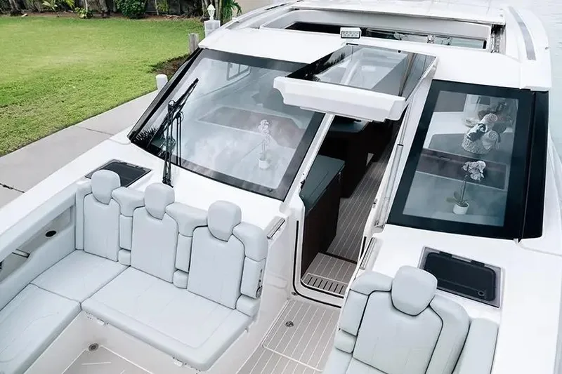 Slide: The Image of Manufacturer Provided Image: 2026 Aquila 46 Coupe yacht with sleek design and spacious seating area. - 3