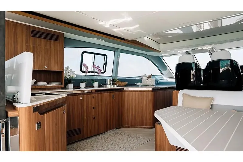 Slide: The Image of Manufacturer Provided Image: Luxurious interior of 2026 Aquila 46 Coupe yacht with modern wood finishes and seating. - 8
