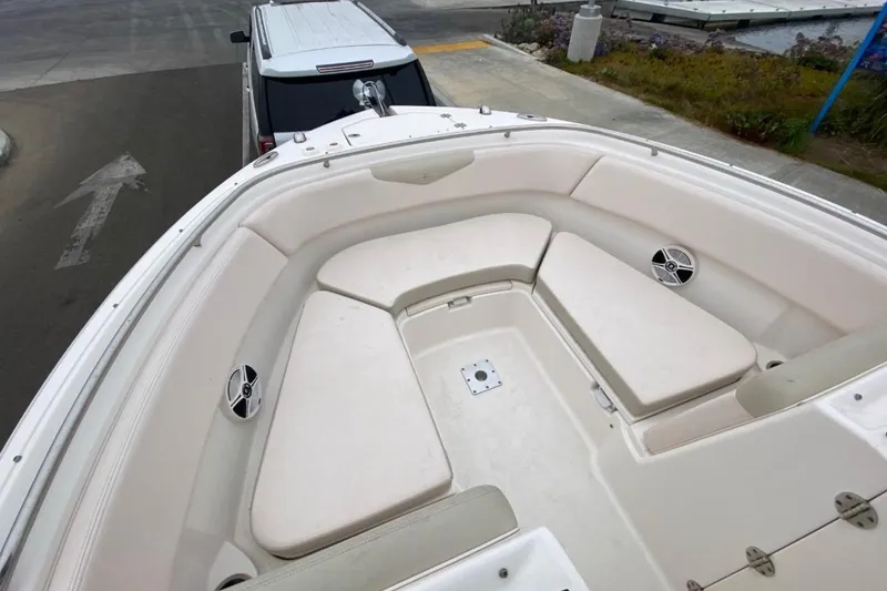 Slide: The Image of 2017 Robalo R247 Dual Console boat with spacious bow seating area. - 8