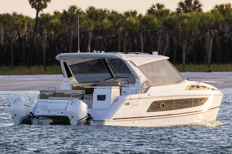 Slide: The Image of Manufacturer Provided Image: Aquila 36 Sport 2026 boat on water near a tropical shoreline. - 4