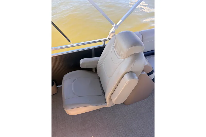 Slide: The Image of 2019 Crestliner 200 Rally CS boat seat with beige upholstery and water view. - 6