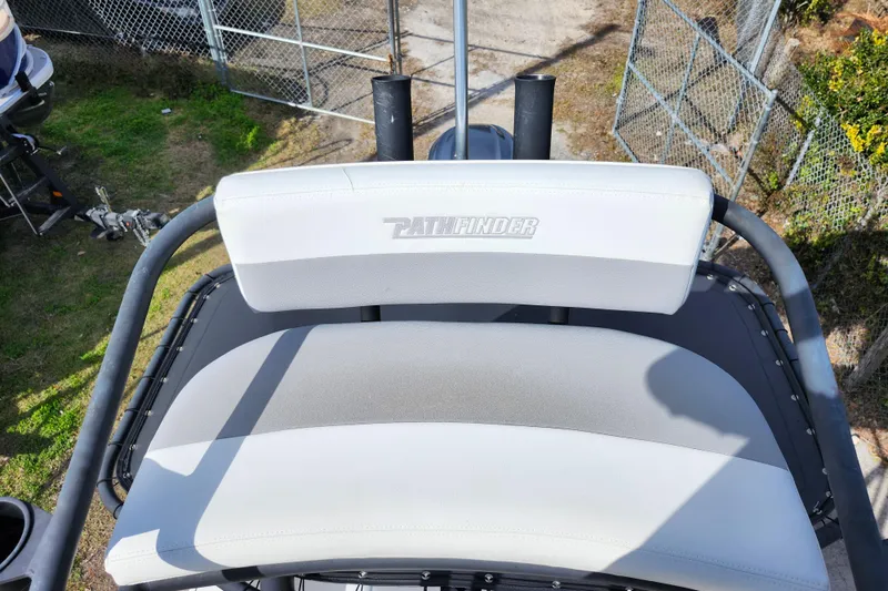 Slide: The Image of 2022 Pathfinder 2400 TRS boat seat with logo, outdoor setting. - 31