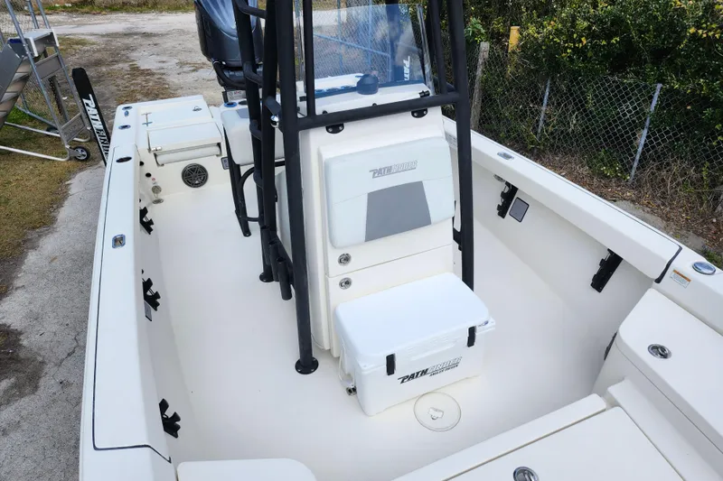 Slide: The Image of 2022 Pathfinder 2400 TRS boat interior with seating and storage compartments. - 45