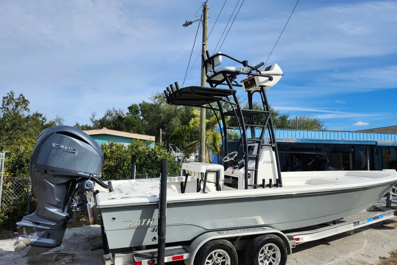 Slide: The Image of 2022 Pathfinder 2400 TRS boat on trailer with Yamaha outboard motor. - 7
