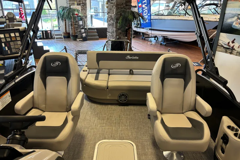 Slide: The Image of 2026 Barletta ARIA 22UC boat interior with plush seating and modern design. - 12