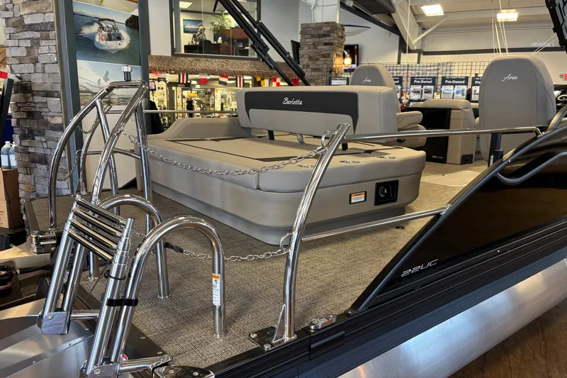Slide: The Image of 2026 Barletta ARIA 22UC pontoon boat interior with seating and railing. - 6