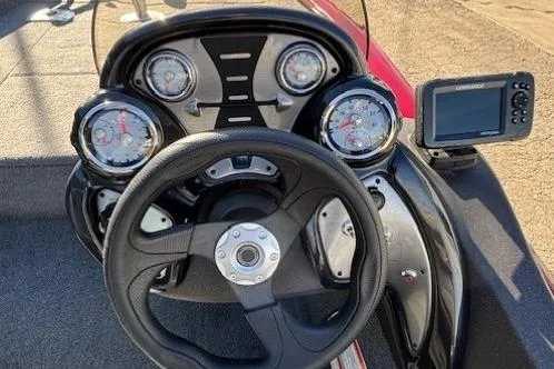Slide: The Image of 2023 Tracker Pro Team 175 TF dashboard with steering wheel and gauges. - 17