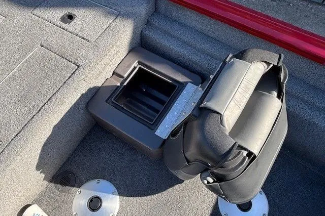 Slide: The Image of 2023 Tracker Pro Team 175 TF boat interior with storage compartment and seating. - 19