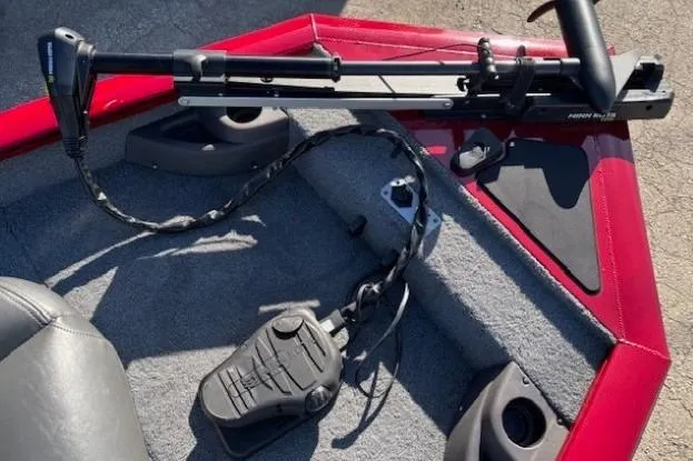 Slide: The Image of 2023 Tracker Pro Team 175 TF boat interior with trolling motor and foot pedal. - 8