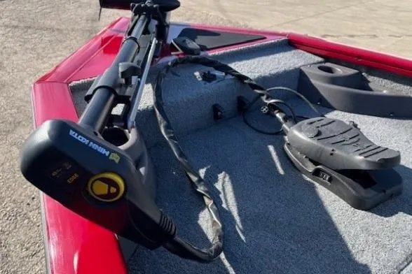 Slide: The Image of 2023 Tracker Pro Team 175 TF boat with Minn Kota trolling motor on deck. - 9