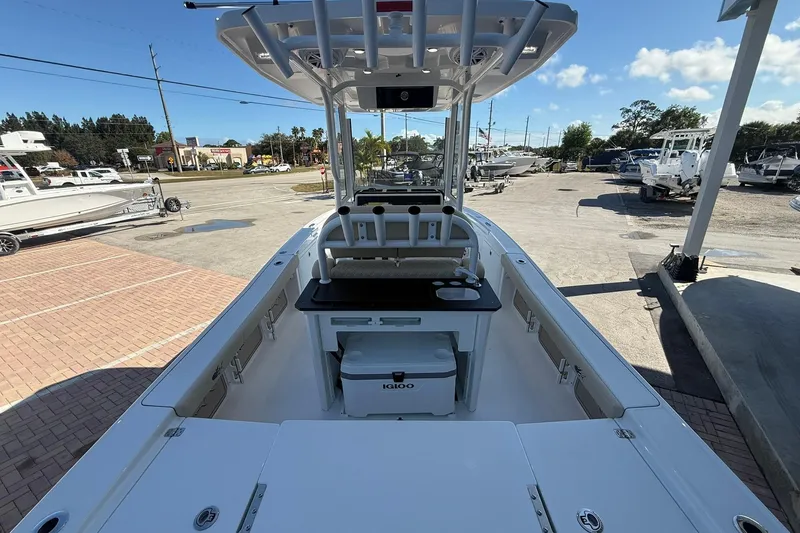 Slide: The Image of 2026 Crevalle 24 HCO boat interior with center console and storage compartments. - 10