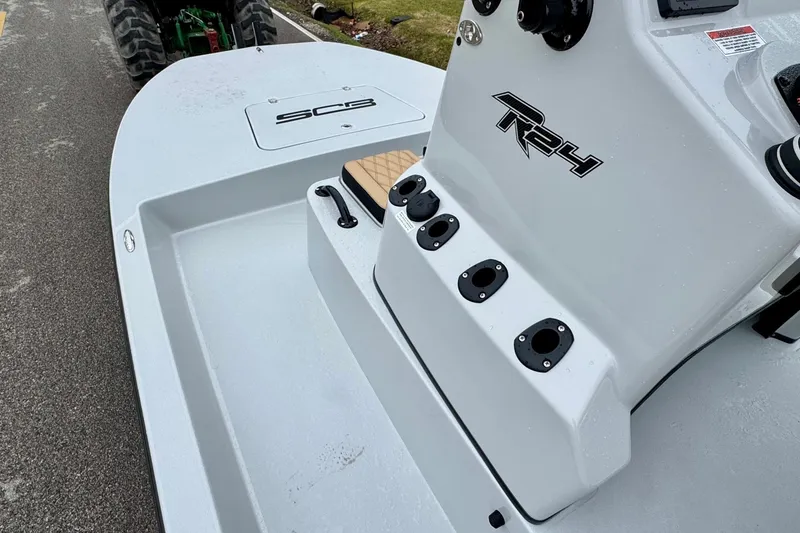 Slide: The Image of 2026 SCB R24 boat with sleek design and features. - 13
