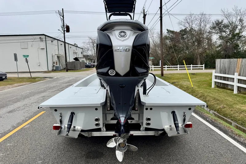 Slide: The Image of Rear view of SCB R24 boat with outboard motor, 2026 model. - 5