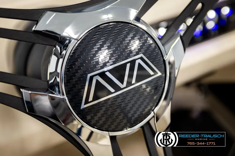 Slide: The Image of Steering wheel of 2026 Avalon LSZ ENT with carbon fiber design and logo. - 36