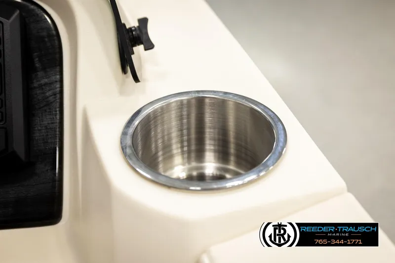 Slide: The Image of Cup holder on 2026 Avalon LSZ ENT boat console, Reeder-Trausch Marine logo visible. - 41