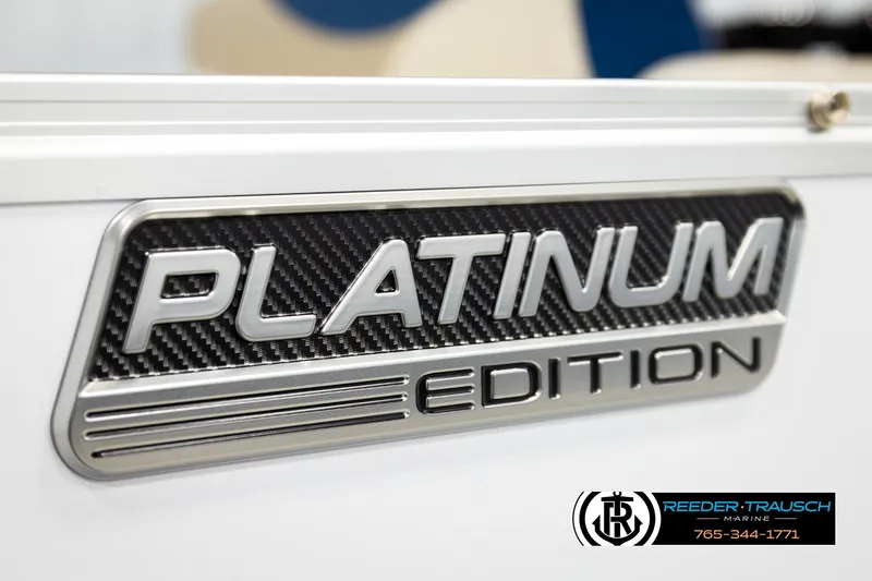 Slide: The Image of 2026 Avalon LSZ ENT Platinum Edition badge with carbon fiber texture. - 54
