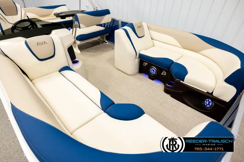 Slide: The Image of Luxurious 2026 Avalon LSZ ENT boat interior with blue and beige seating, featuring modern design. - 9