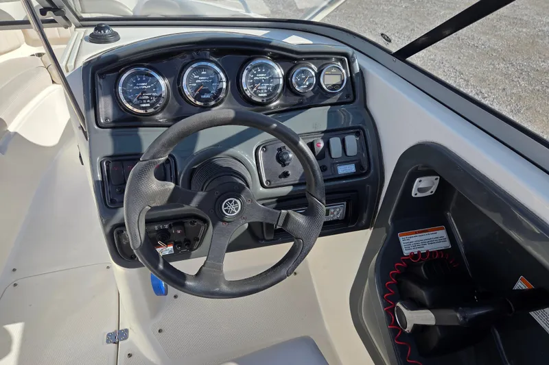 Slide: The Image of 2008 Yamaha Boats AR230 HO dashboard with steering wheel and instrument panel. - 10