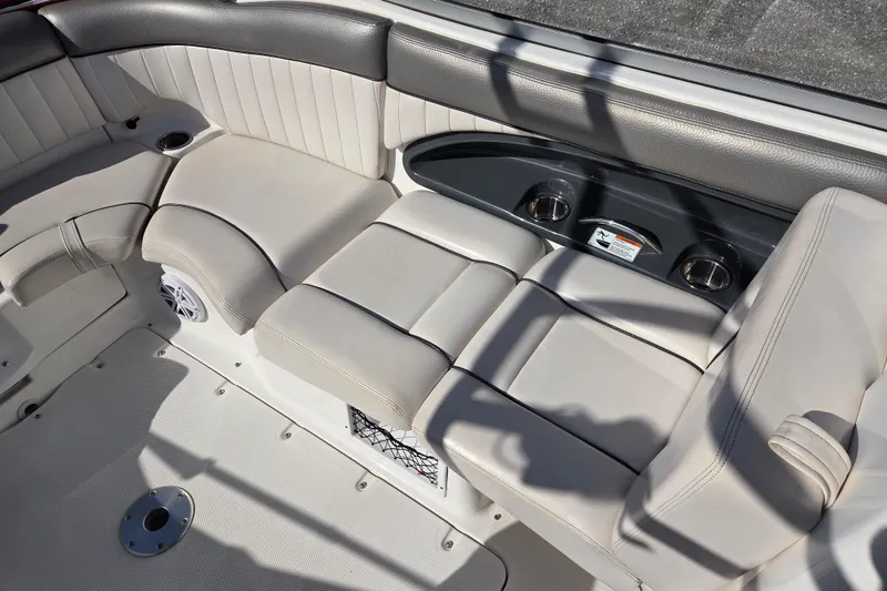 Slide: The Image of 2008 Yamaha Boats AR230 HO interior seating with cup holders and speaker. - 11