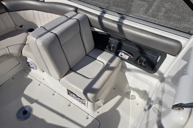 Slide: The Image of 2008 Yamaha Boats AR230 HO interior seating with cup holders and speaker. - 12