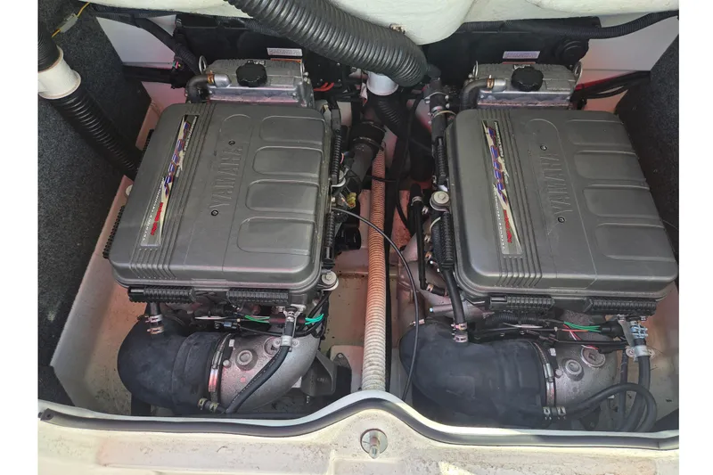 Slide: The Image of 2008 Yamaha Boats AR230 HO engine compartment with dual engines. - 14