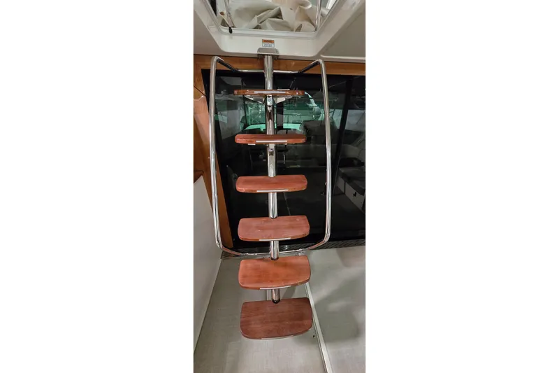 Slide: The Image of 2024 Regal 42 Fly yacht in storage, showcasing sleek design and modern features. - 12