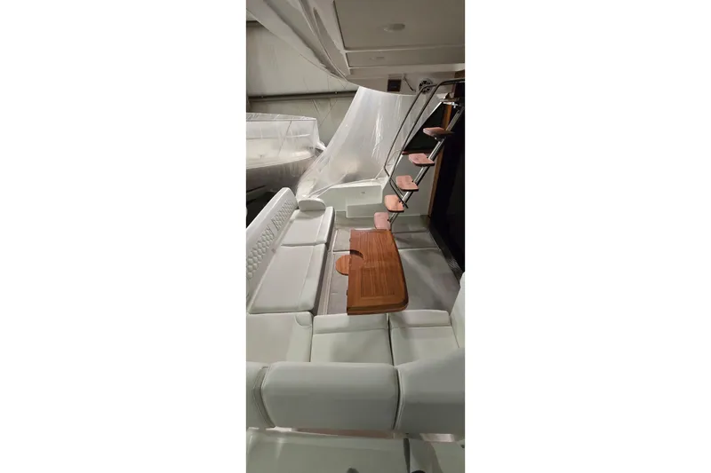 Slide: The Image of 2024 Regal 42 Fly yacht interior with open drawer-style refrigerator. - 19