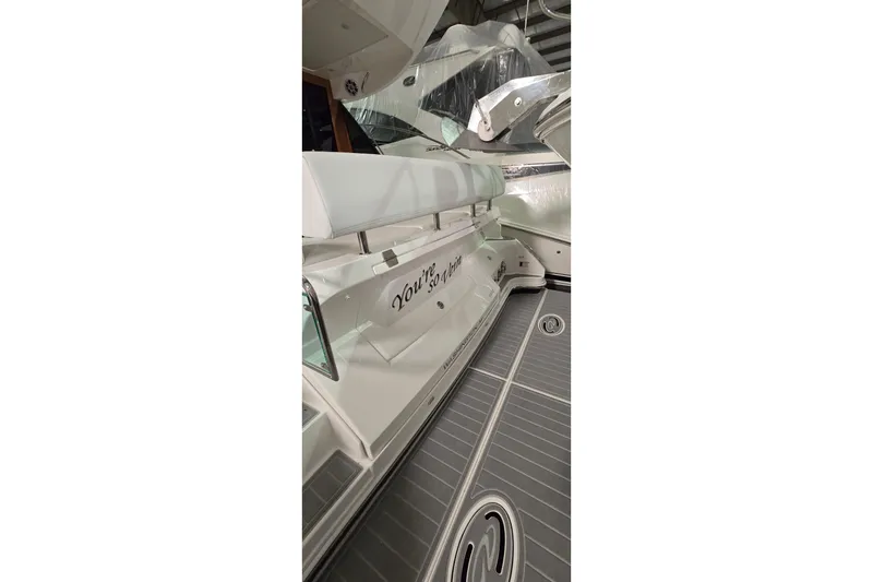 Slide: The Image of 2024 Regal 42 Fly yacht storage compartment with ropes and supplies, Washington, MI. - 21