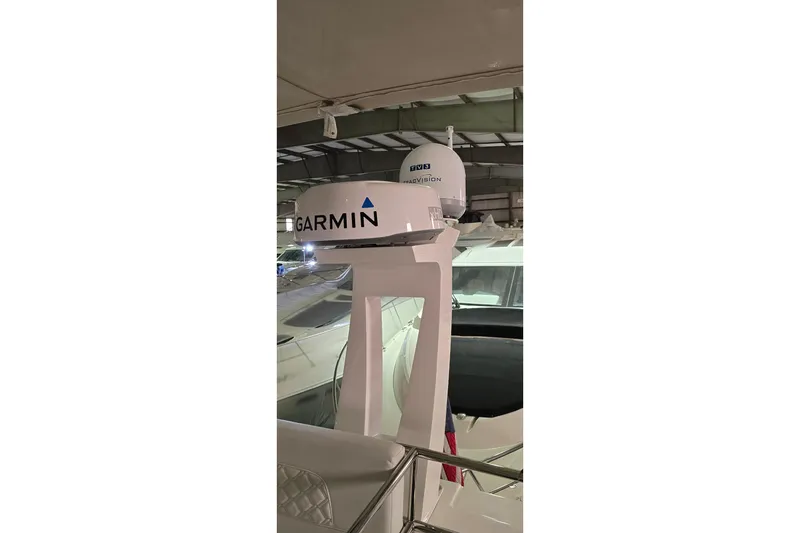 Slide: The Image of Luxurious interior of 2024 Regal 42 Fly yacht with elegant seating and wooden table. - 31