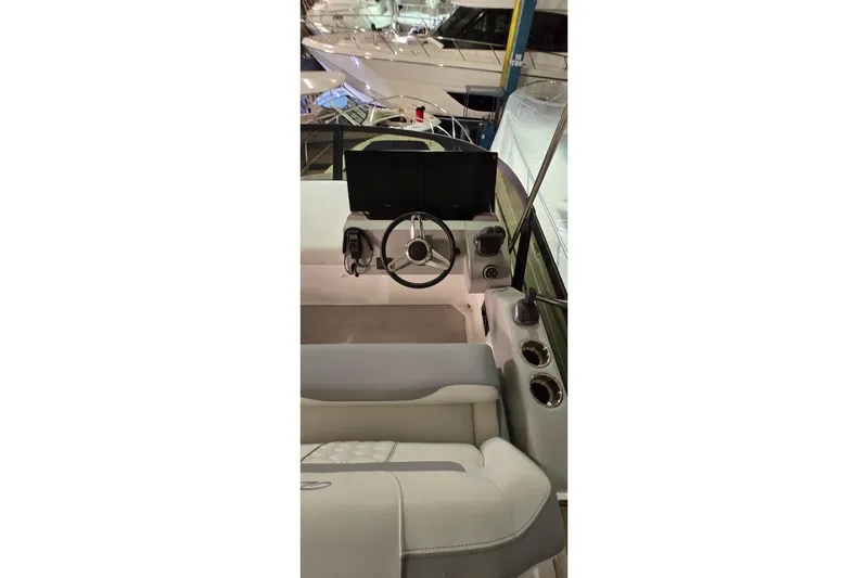 Slide: The Image of 2024 Regal 42 Fly yacht with Garmin radar in a marina storage facility. - 37