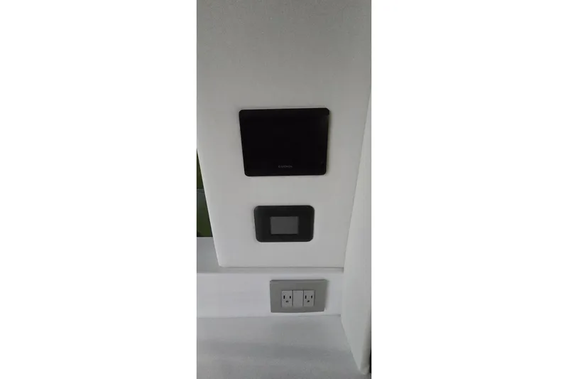 Slide: The Image of Luxurious bedroom interior of 2024 Regal 42 Fly yacht with cozy bedding and pillows. - 53