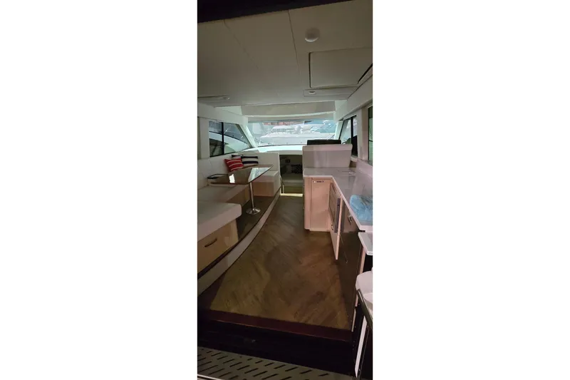 Slide: The Image of Luxurious interior cabin of 2024 Regal 42 Fly yacht with elegant bedding. - 55