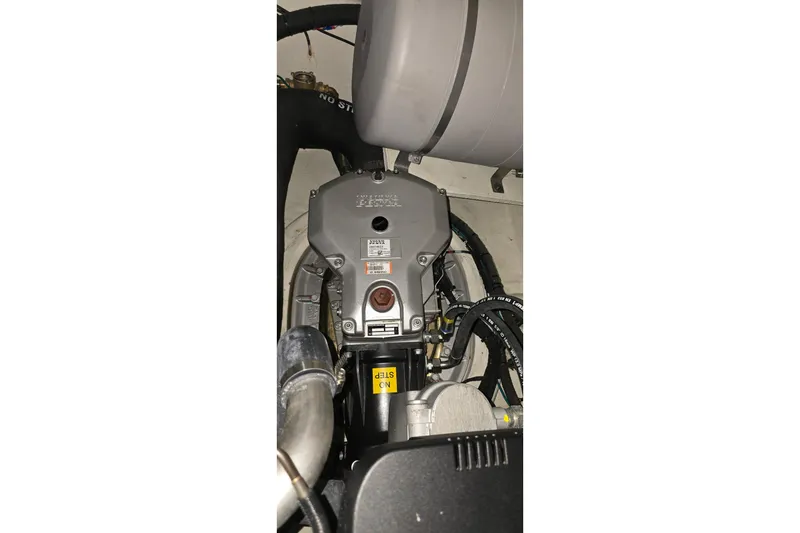 Slide: The Image of Engine compartment of 2024 Regal 42 Fly yacht with Volvo Penta engines. - 74