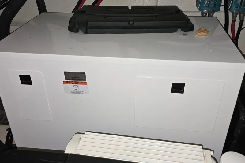 Slide: The Image of Close-up of Volvo Penta steering unit label on 2024 Regal 42 Fly. - 81