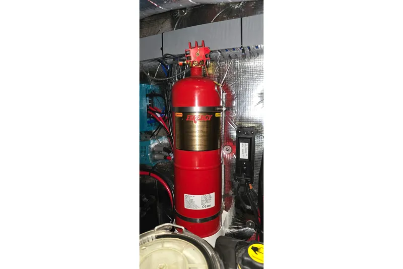 Slide: The Image of Label details on a 2024 Regal 42 Fly engine, featuring Volvo Penta specifications and safety warnings. - 83