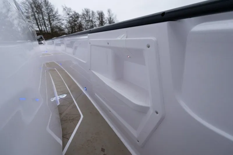 Slide: The Image of 2027 Axopar 38 Cross Cabin boat deck with sleek design and integrated lighting. - 22