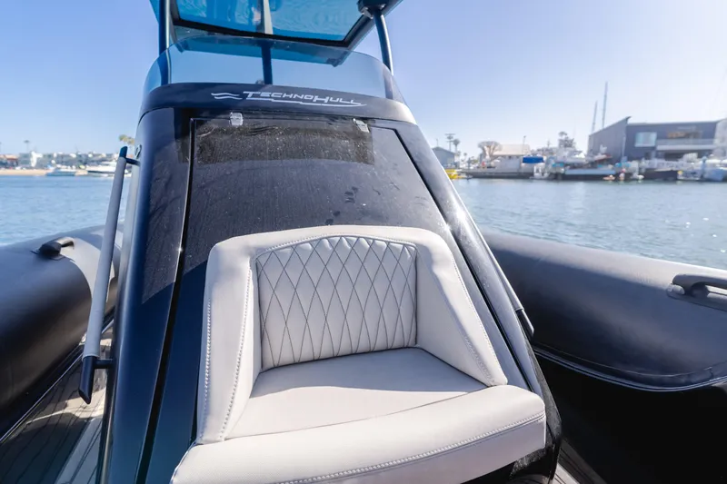 Slide: The Image of 2019 Technohull Sea DNA 999 boat interior with luxurious seating and waterfront view. - 17