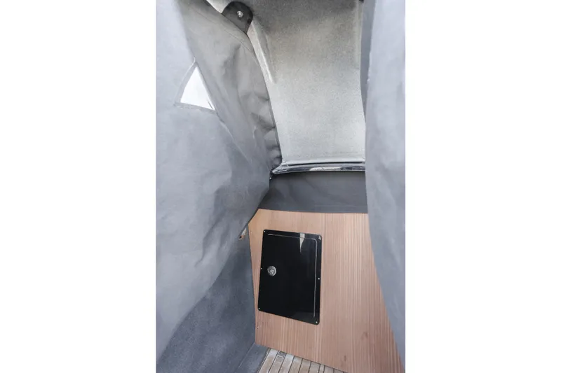 Slide: The Image of Interior cabin of 2019 Technohull Sea DNA 999 with wood paneling and fabric walls. - 19