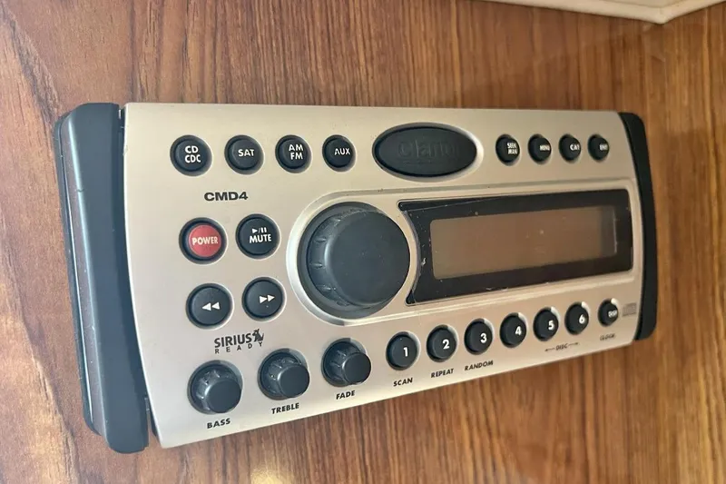 Slide: The Image of Clarion CMD4 marine stereo system on 2007 Pursuit OS 285 Offshore boat. - 16