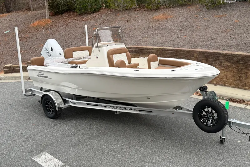 The Image of 2026 Pioneer 180 Islander boat on trailer, featuring sleek design and modern amenities. - 0