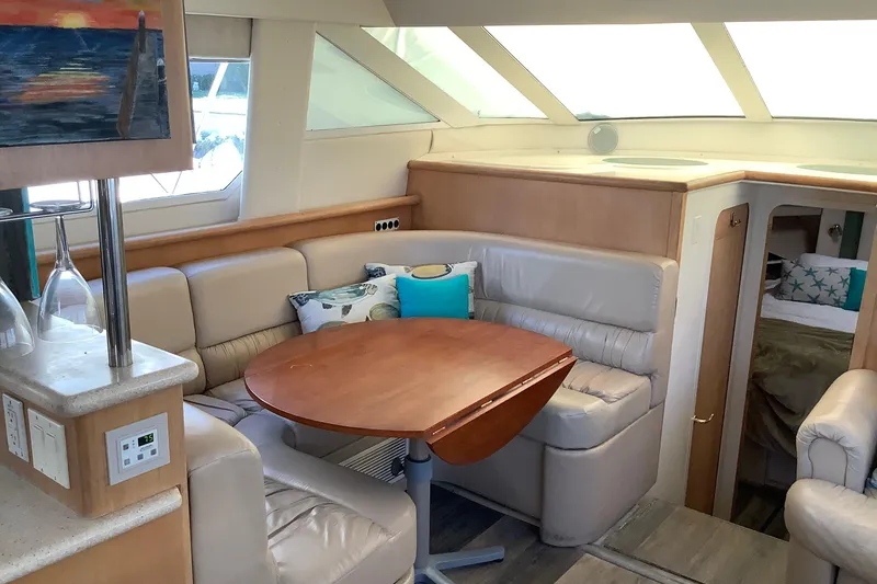 Slide: The Image of 1997 Carver 500 Cockpit Motor Yacht kitchen with electric stove and knife set. - 14