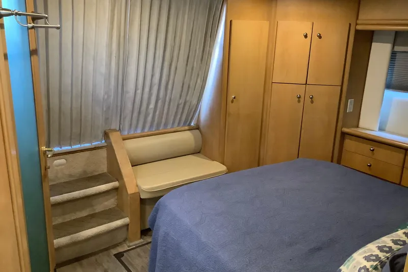 Slide: The Image of 1997 Carver 500 Cockpit Motor Yacht interior with cozy seating and modern decor. - 3