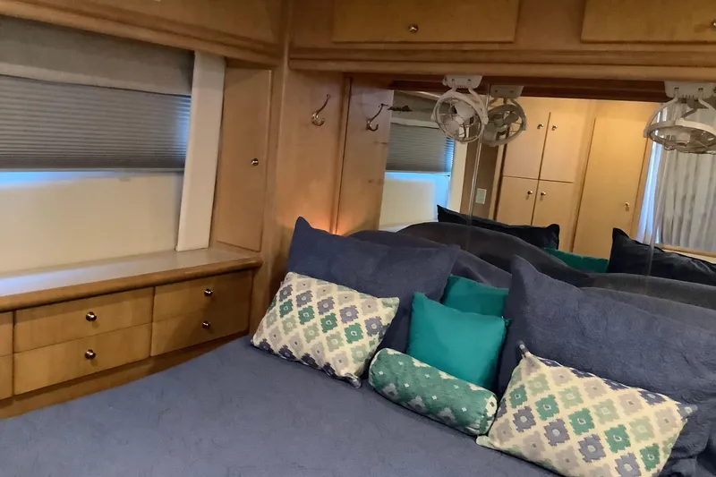 Slide: The Image of Interior of 1997 Carver 500 Cockpit Motor Yacht with beige leather seating. - 4